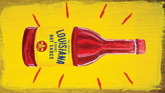 Louisiana Hot Sauce Painted bottle on painted plywood background